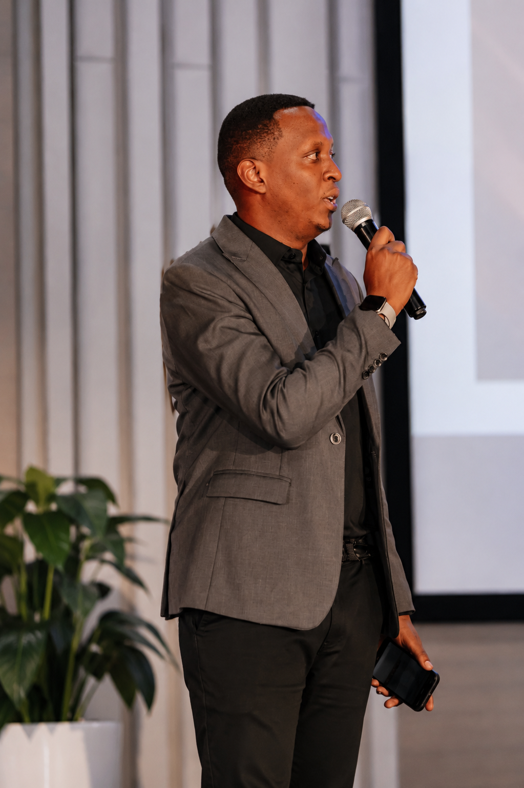 David Kayitare with microphone